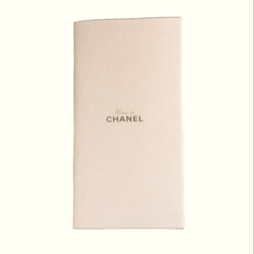 CHANEL Notebook in peach with metallic silver accent binding